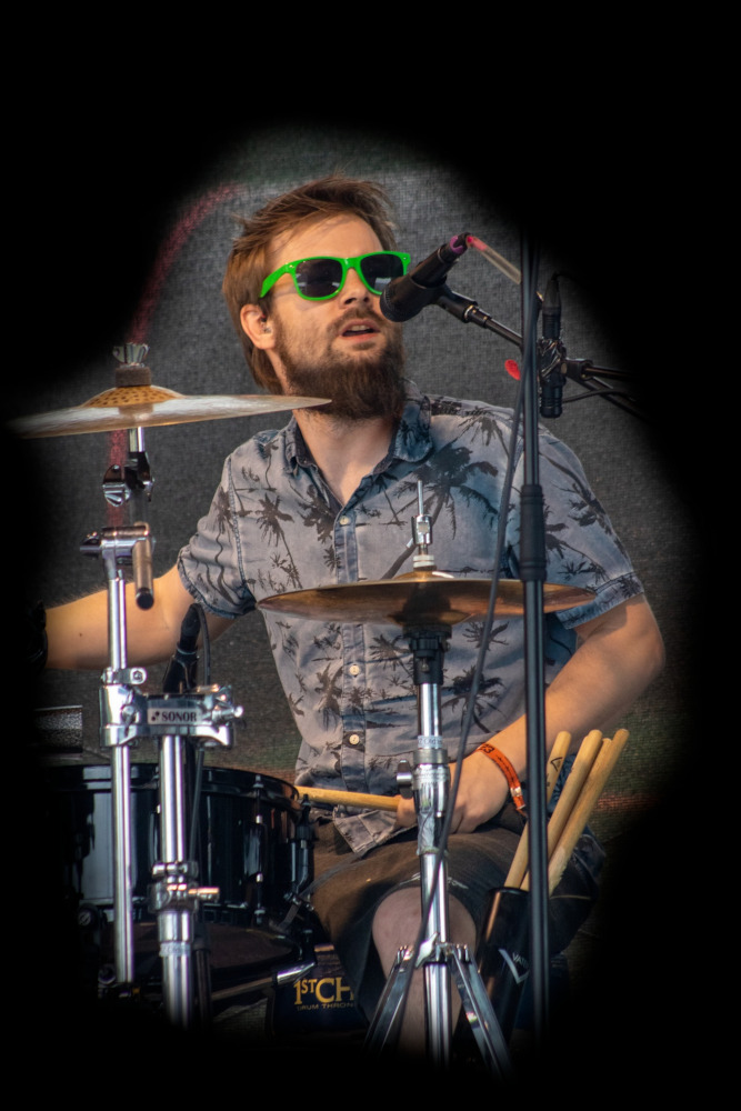 Markus grooving on the drums while singing